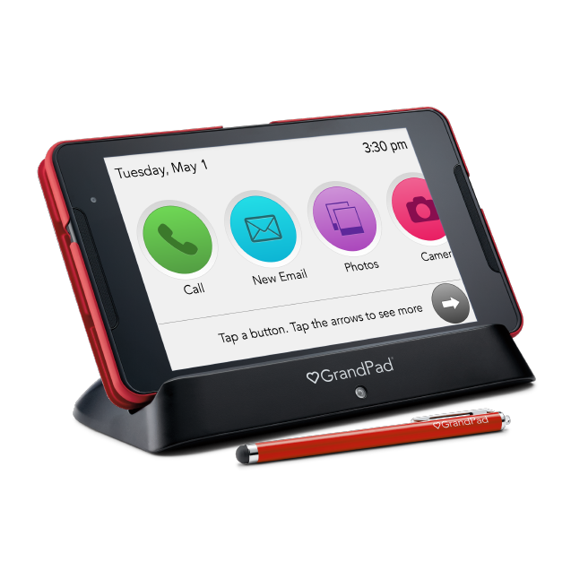 GrandPad tablet is shown on its charging cradle with red stylus in front.