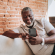 image of a person holding a device